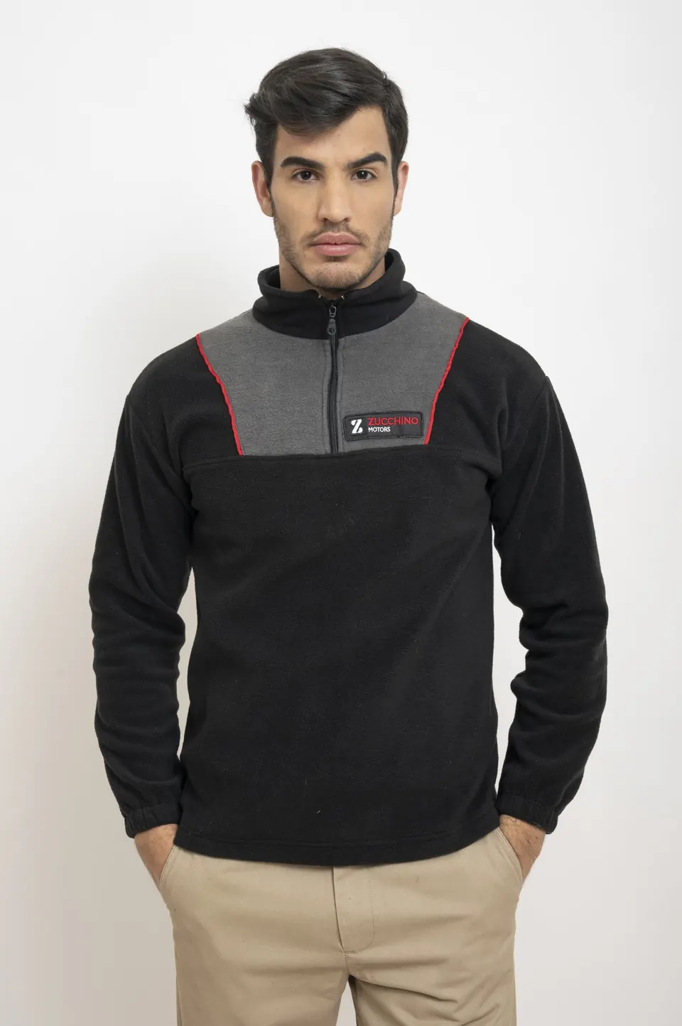 Buzo polar negro y gris medio cierre